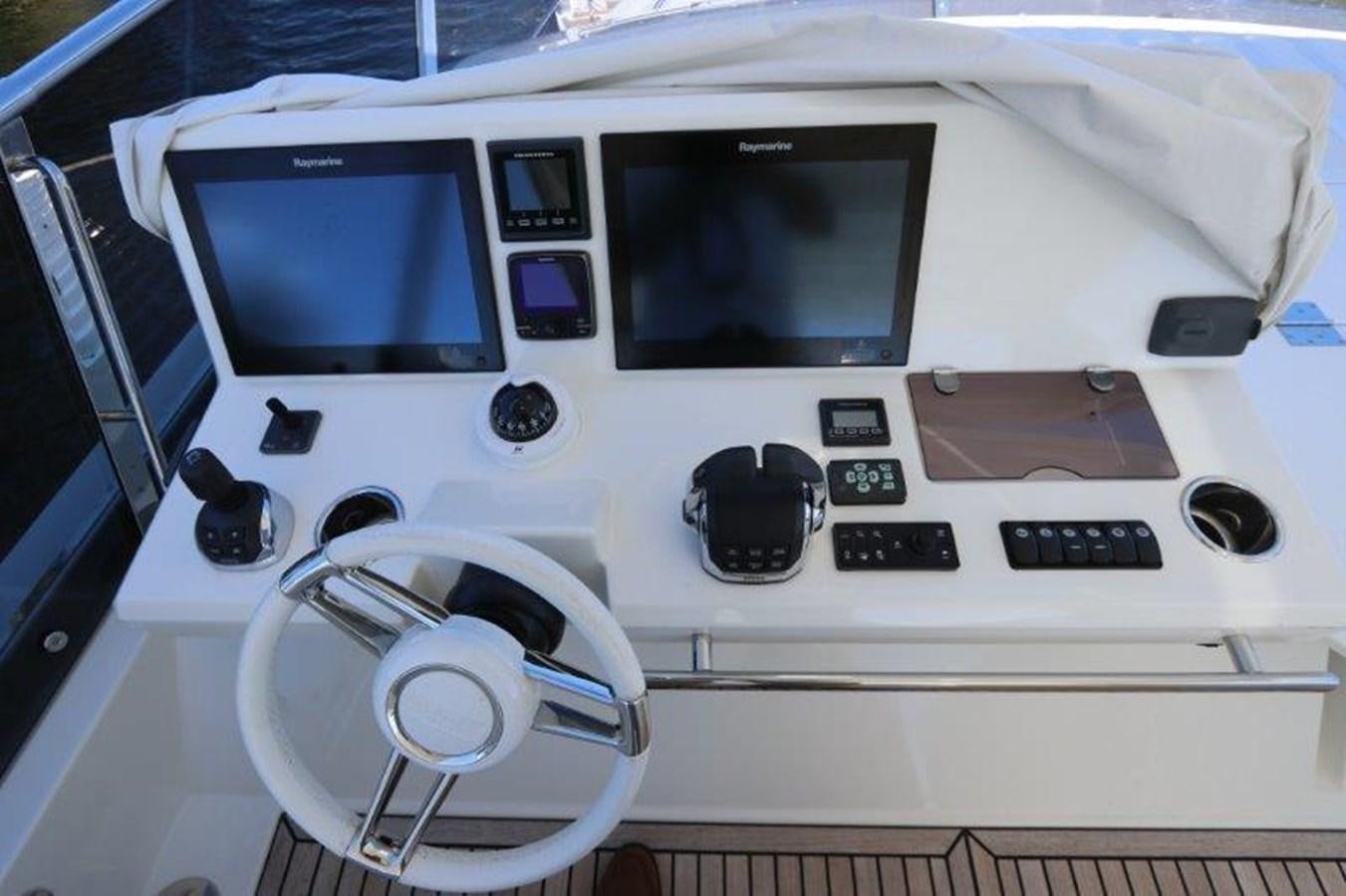 a white machine with a screen and buttons aboard BREATHE EASY Yacht for Sale