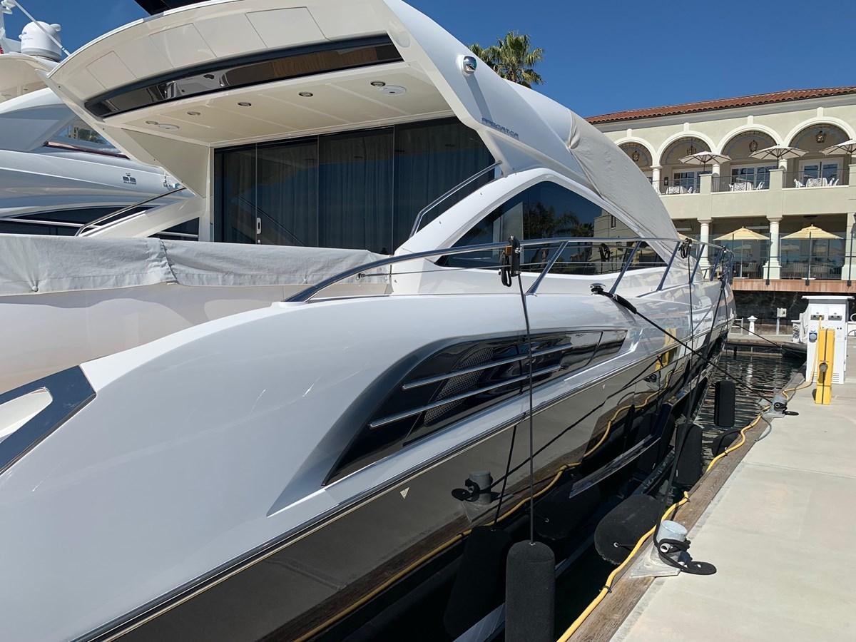 a white boat in a building aboard PIECE OF SHIP Yacht for Sale