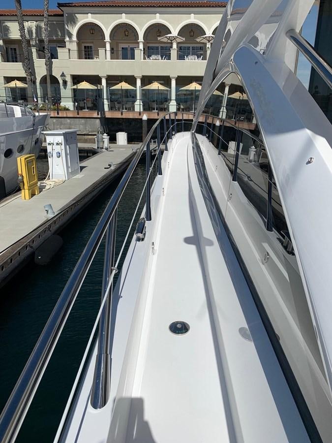 a long white train in a station aboard PIECE OF SHIP Yacht for Sale