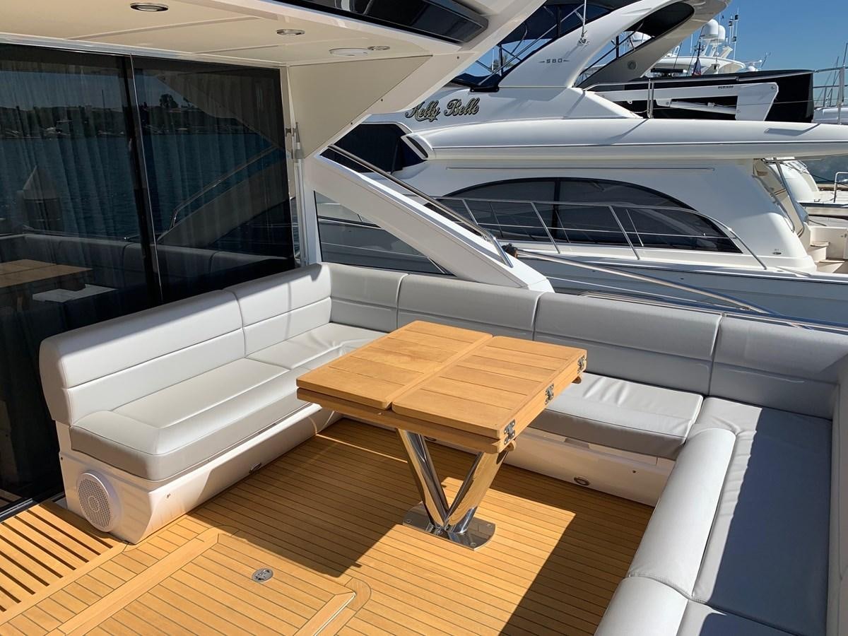 a boat on a deck aboard PIECE OF SHIP Yacht for Sale