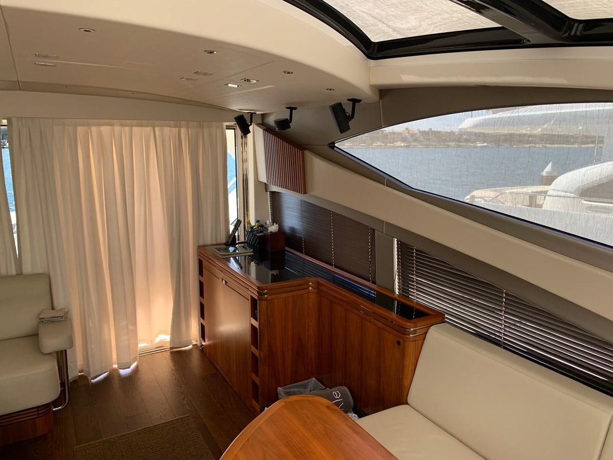 a room with a view of the ocean and a balcony aboard PIECE OF SHIP Yacht for Sale