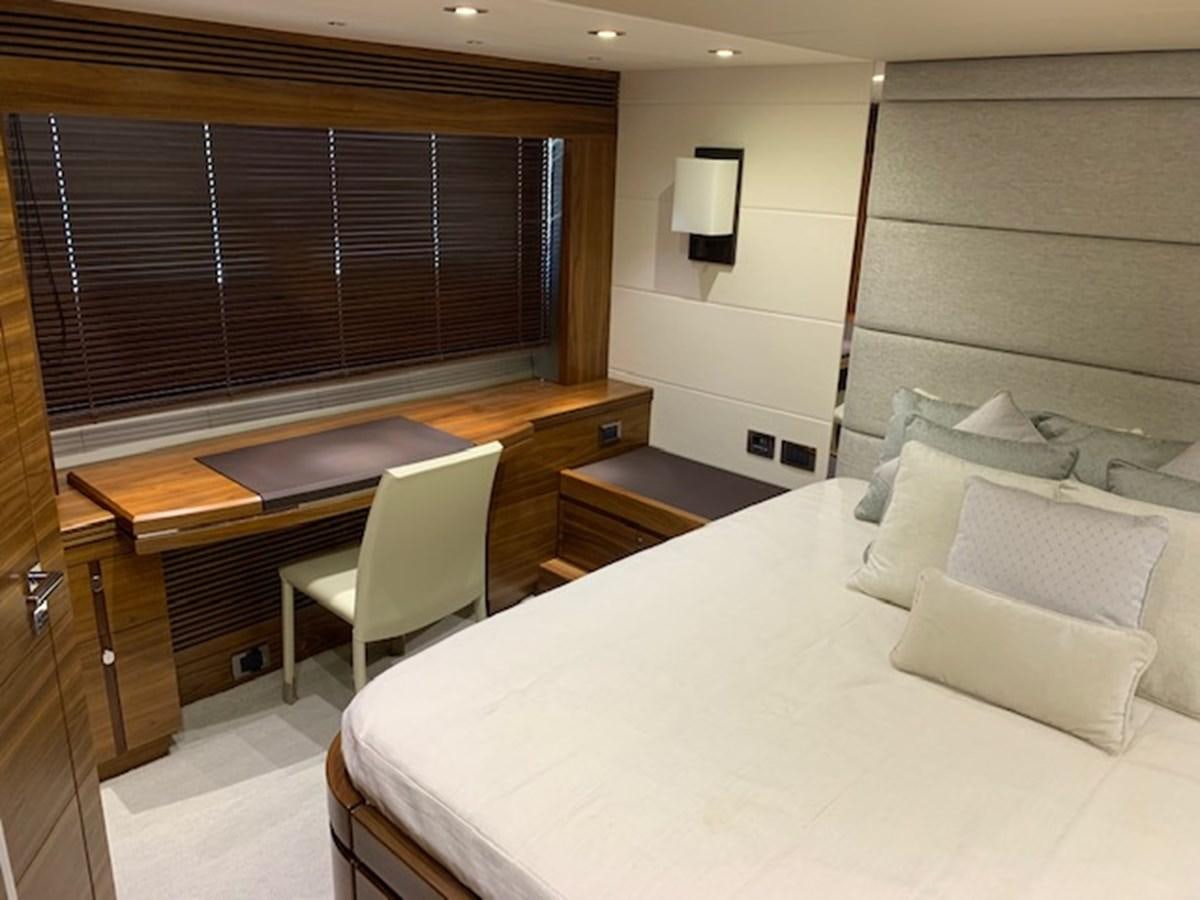 a room with a bed and a desk aboard PIECE OF SHIP Yacht for Sale