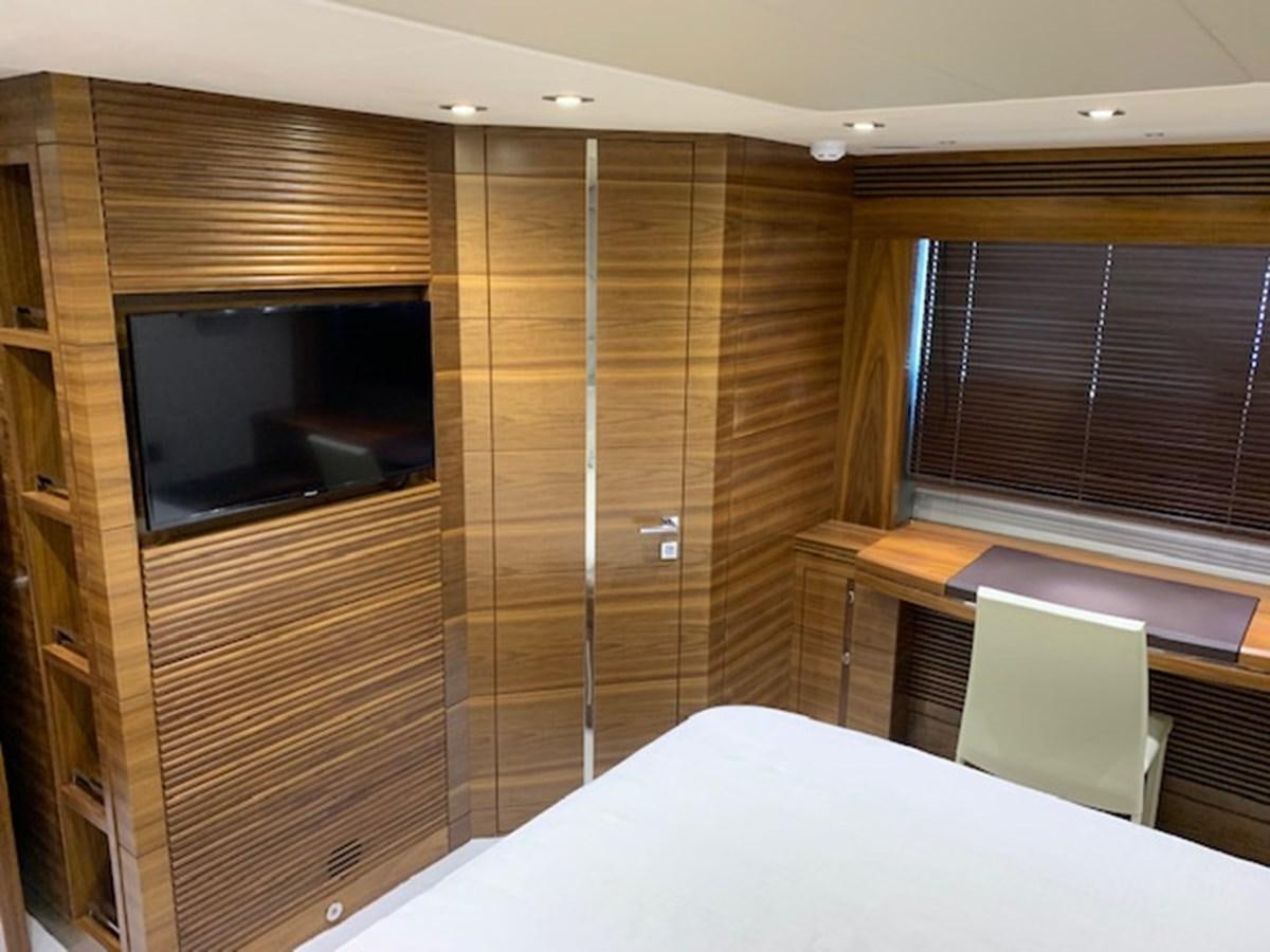 a room with a bed and a television aboard PIECE OF SHIP Yacht for Sale