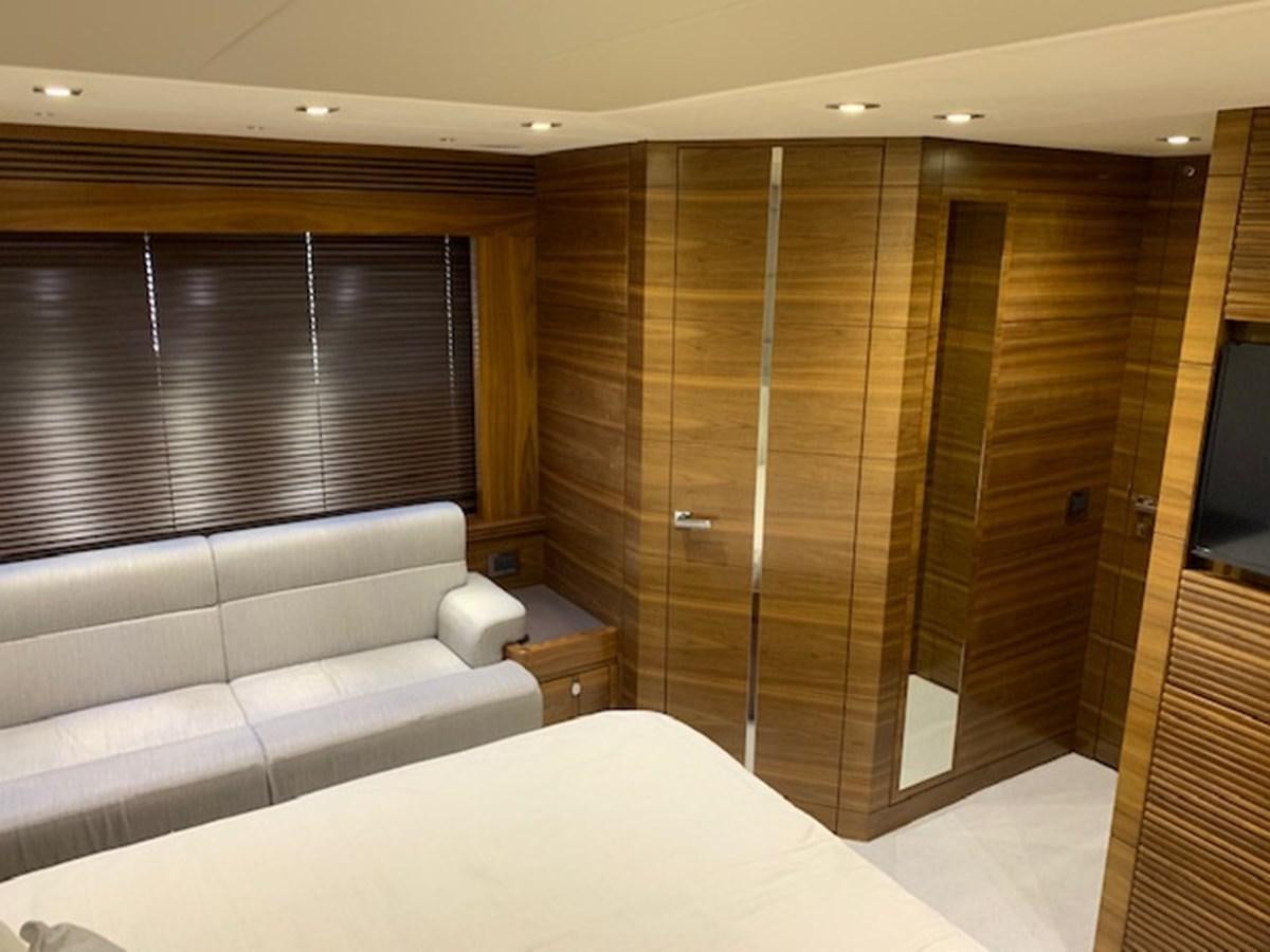a room with a bed and a couch aboard PIECE OF SHIP Yacht for Sale