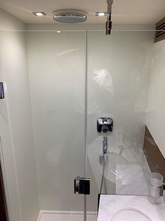 a shower with a glass door aboard PIECE OF SHIP Yacht for Sale