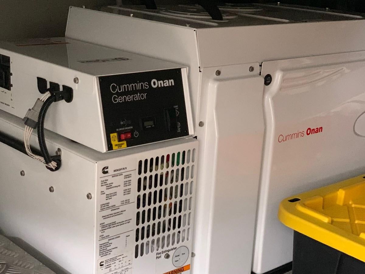 a white machine with a black label aboard PIECE OF SHIP Yacht for Sale