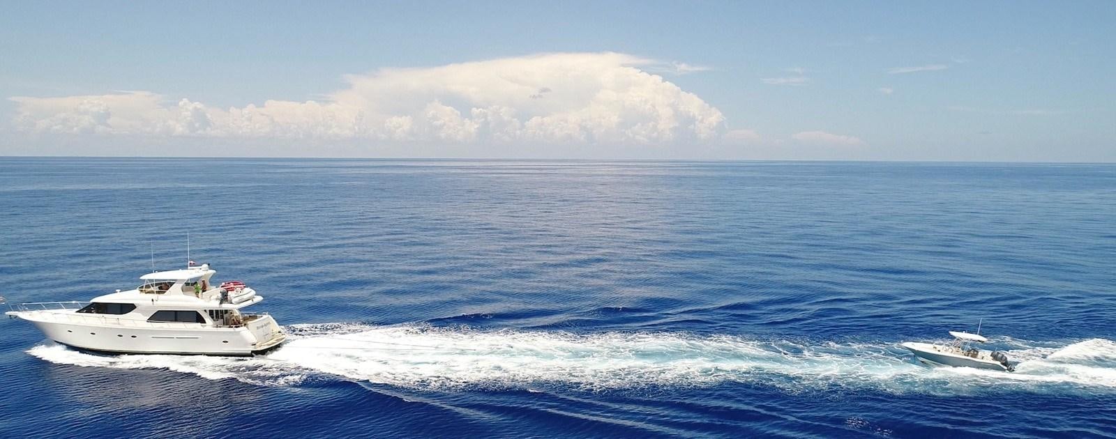 a boat in the ocean aboard ROOM SERVICE Yacht for Sale