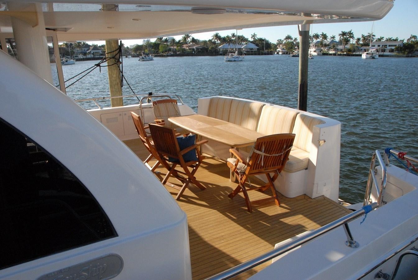 a boat on the water aboard ROOM SERVICE Yacht for Sale