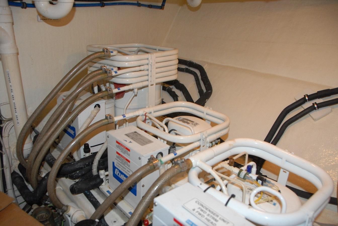 a white and silver machine aboard ROOM SERVICE Yacht for Sale