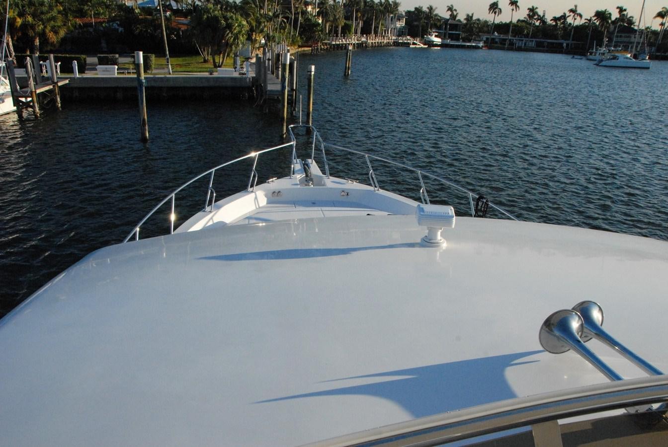 a boat in the water aboard ROOM SERVICE Yacht for Sale