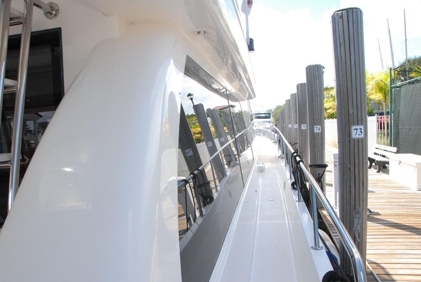 a boat on the water aboard ROOM SERVICE Yacht for Sale