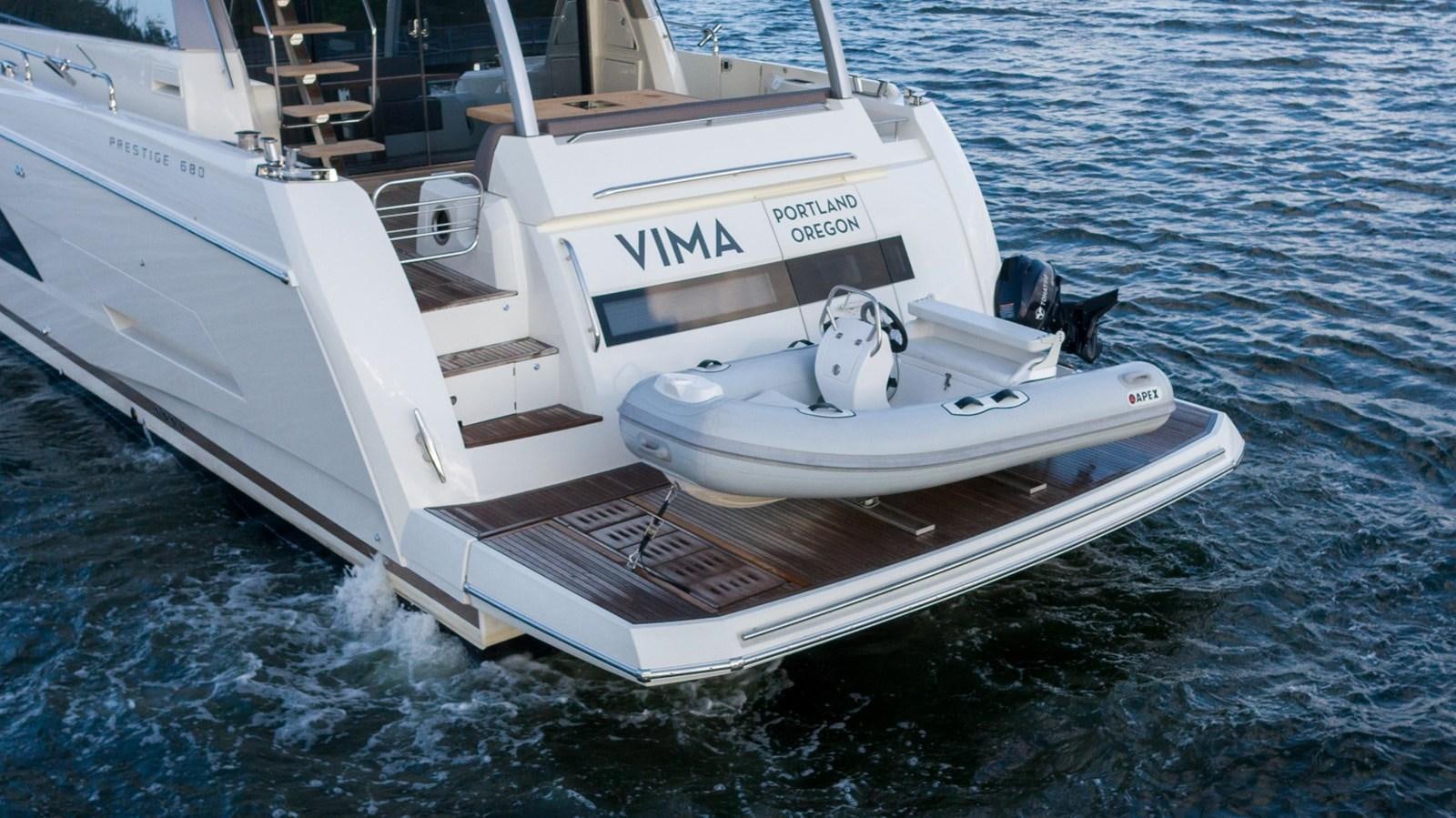 a boat on the water aboard VIMA Yacht for Sale