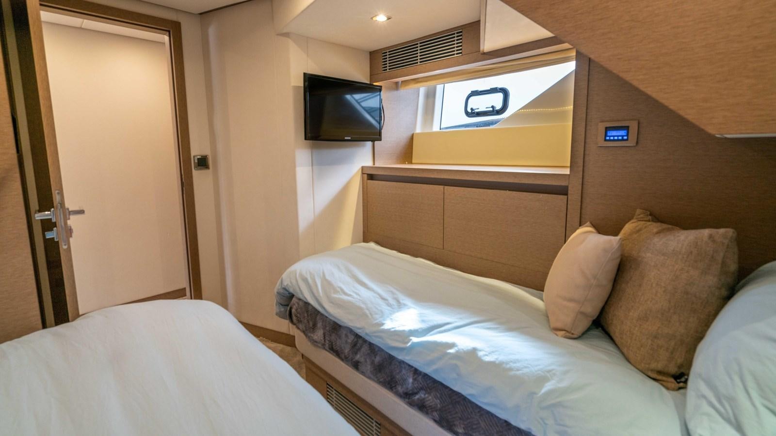a bed with pillows aboard VIMA Yacht for Sale