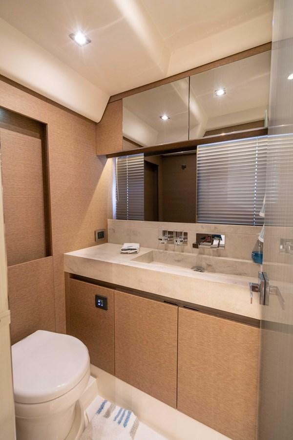 a bathroom with a sink and a toilet aboard VIMA Yacht for Sale