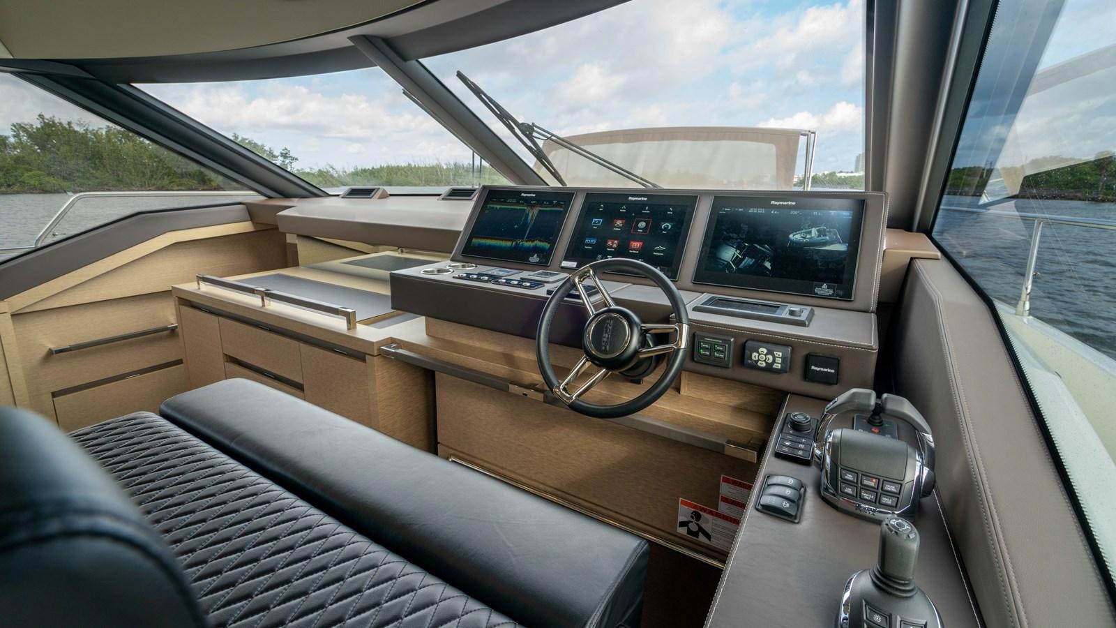 inside of a car aboard VIMA Yacht for Sale