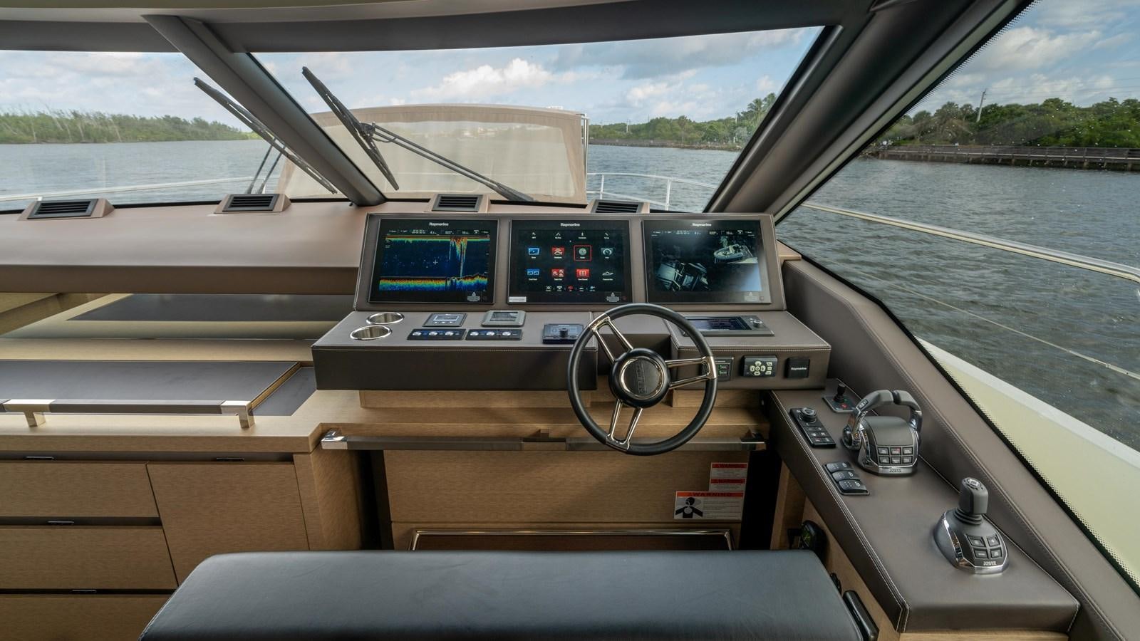 the inside of a car aboard VIMA Yacht for Sale