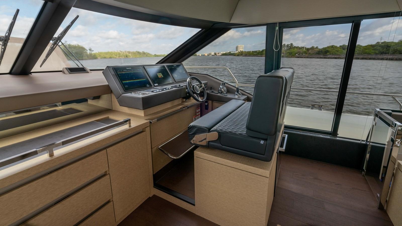 a boat with a laptop on it aboard VIMA Yacht for Sale