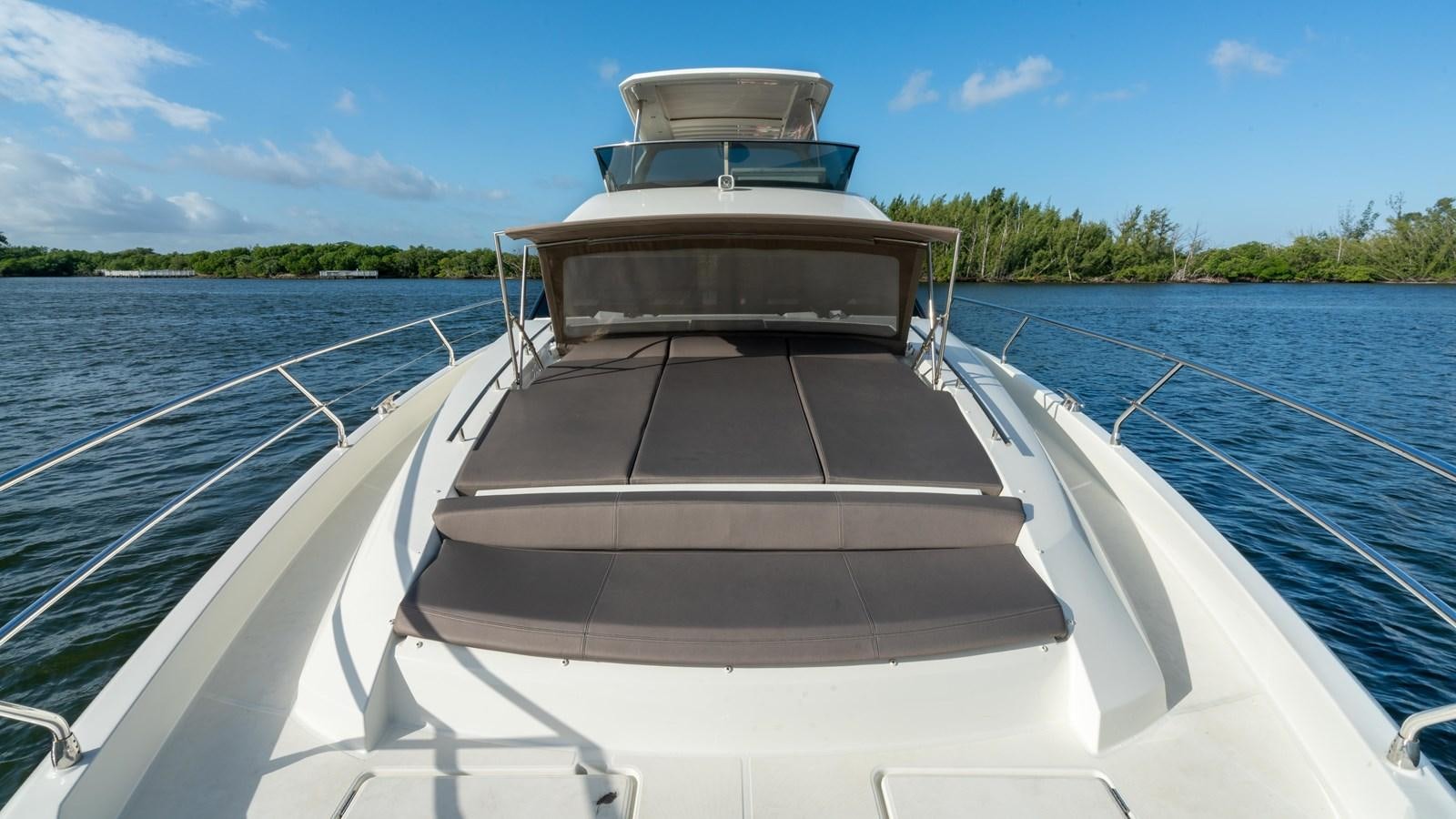 a boat on a body of water aboard VIMA Yacht for Sale