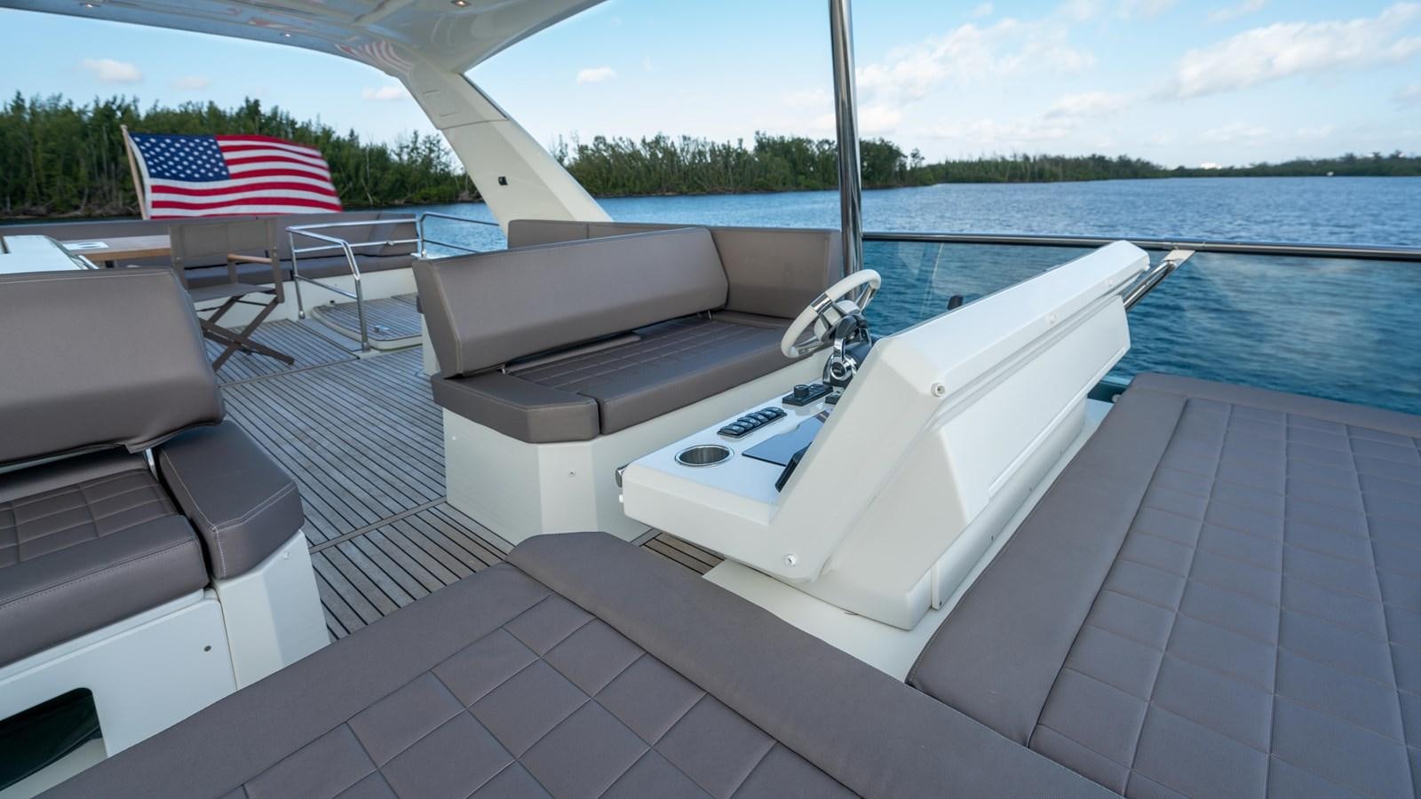 a boat on a deck aboard VIMA Yacht for Sale
