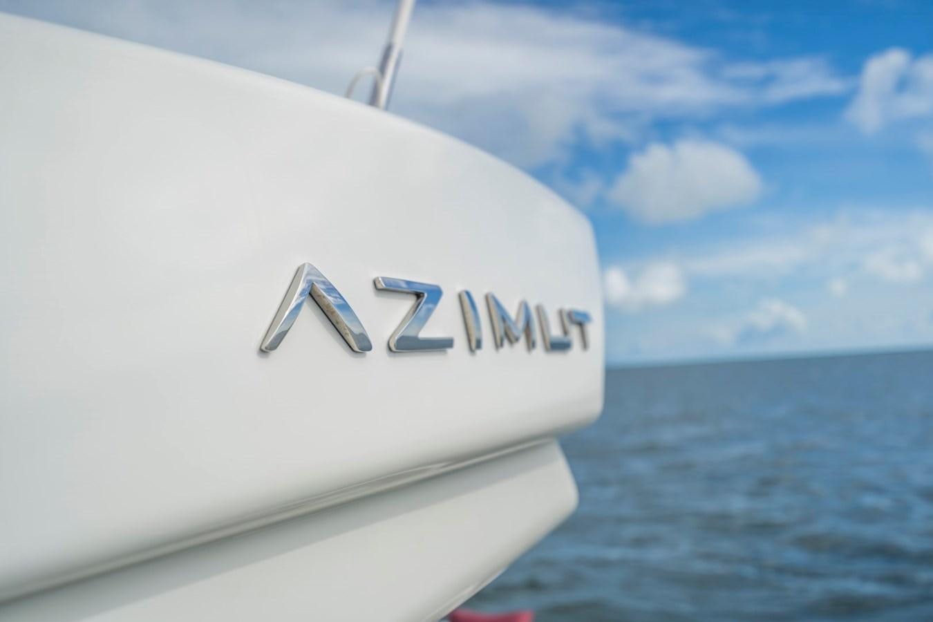 a white boat in the water aboard KNOTORIOUS IV Yacht for Sale