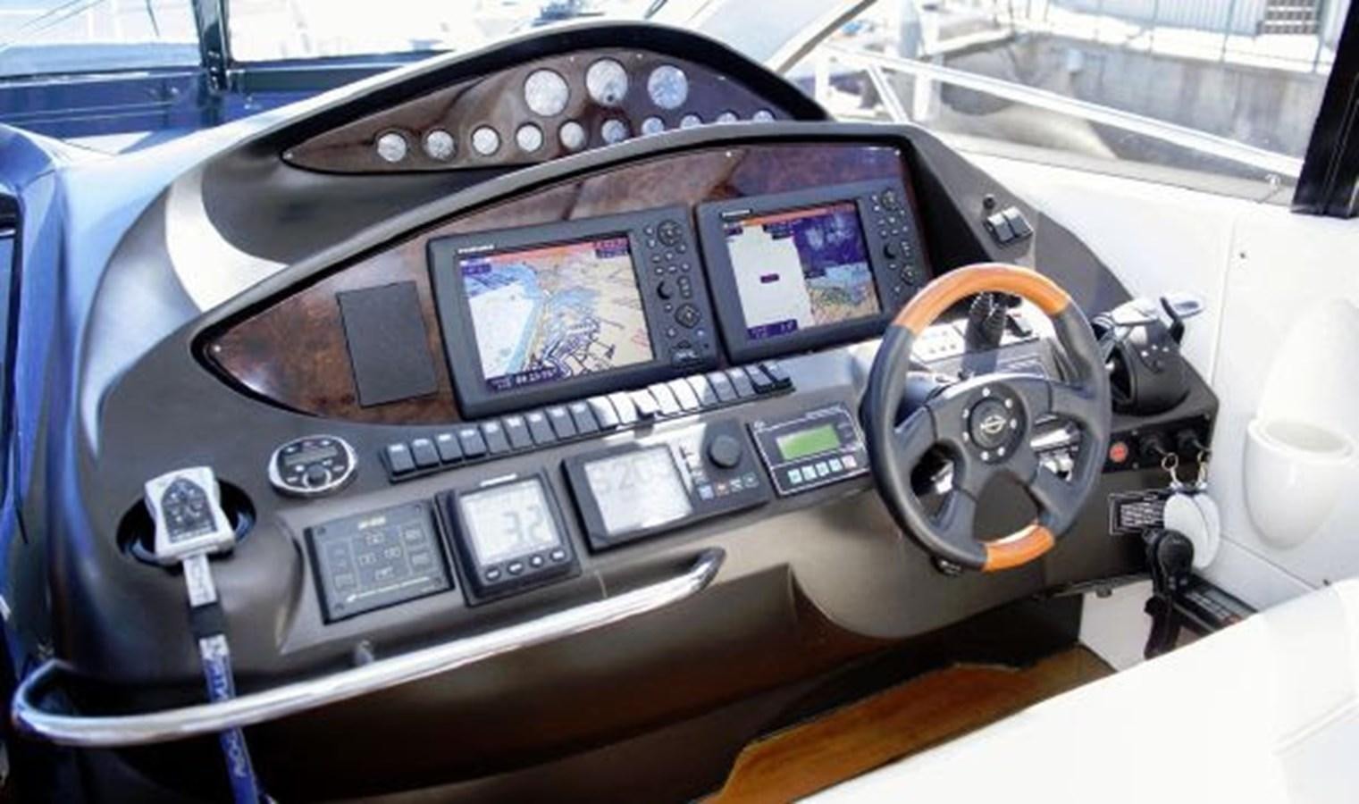 inside of a car aboard SONSEEKER Yacht for Sale