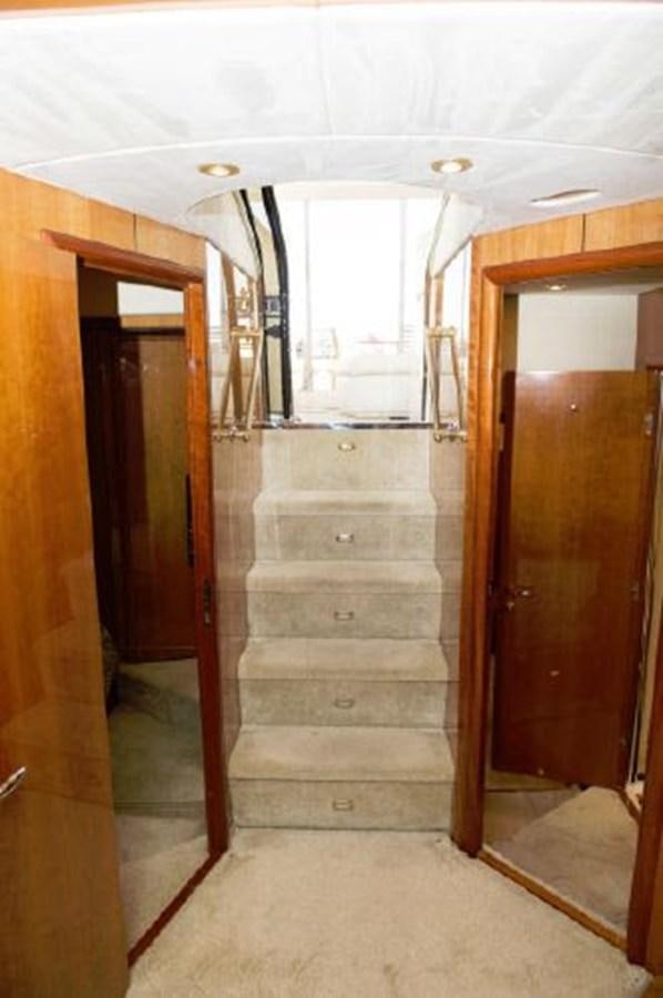 a room with wooden doors aboard SONSEEKER Yacht for Sale