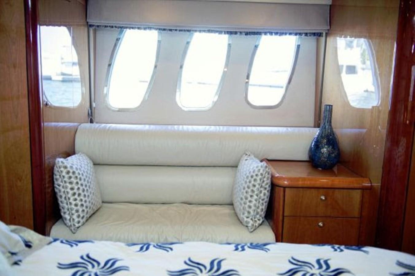a couch in a room aboard SONSEEKER Yacht for Sale