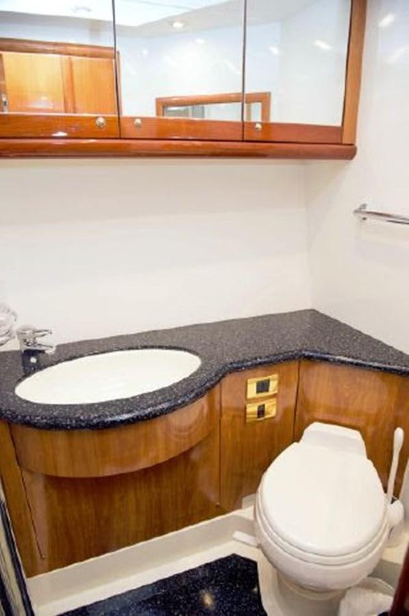 a bathroom with a sink and a toilet aboard SONSEEKER Yacht for Sale