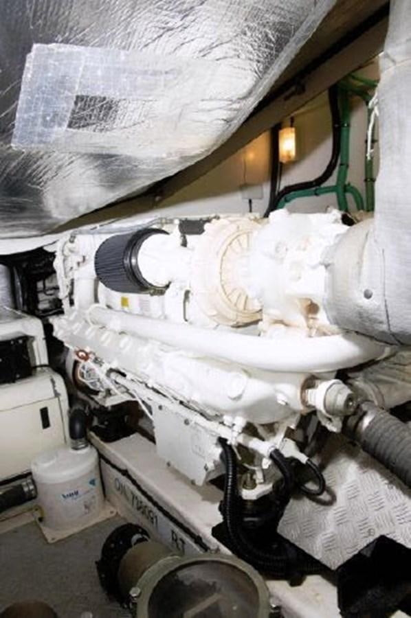 a white car with a hood aboard SONSEEKER Yacht for Sale