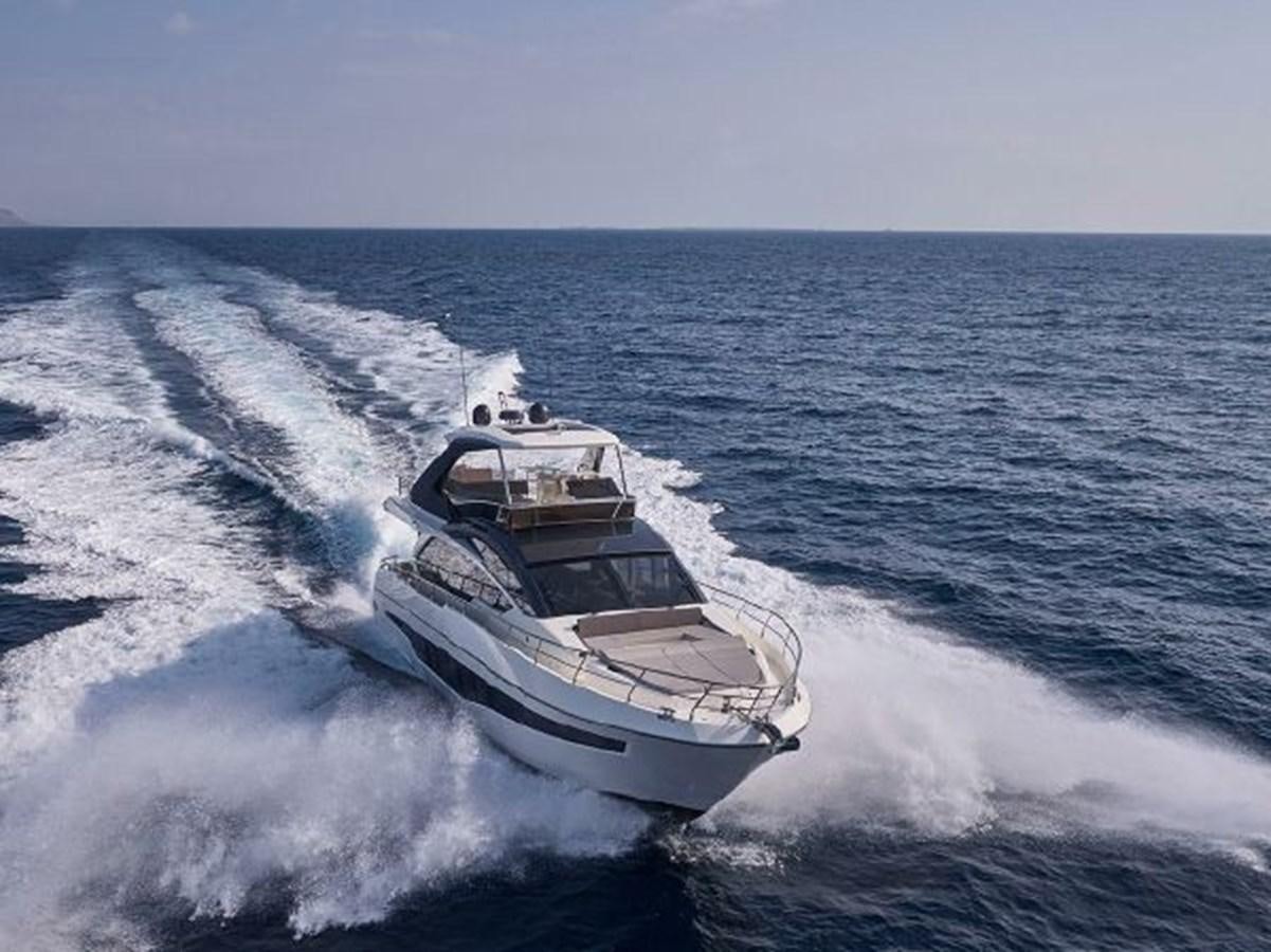 a boat on the water aboard 2021 ASTONDOA 66 FLYBRIDGE Yacht for Sale
