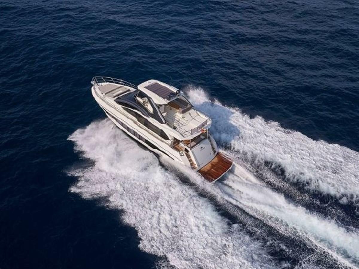 a military ship in the water aboard 2021 ASTONDOA 66 FLYBRIDGE Yacht for Sale