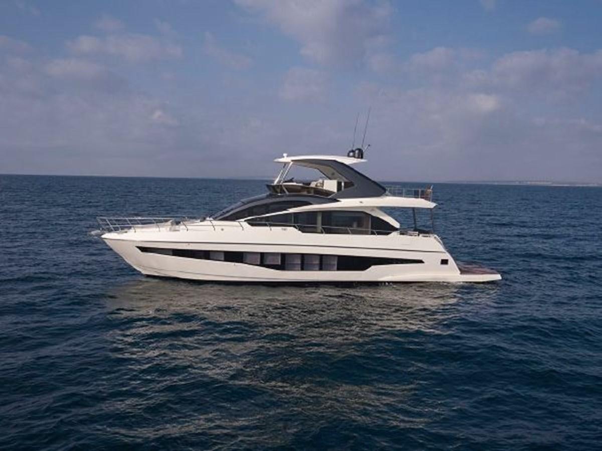 a boat in the water aboard 2021 ASTONDOA 66 FLYBRIDGE Yacht for Sale