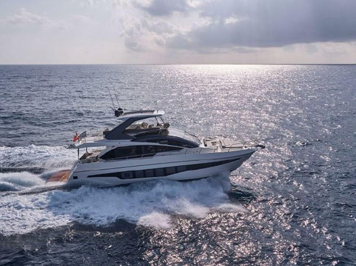 a boat on the water aboard 2021 ASTONDOA 66 FLYBRIDGE Yacht for Sale