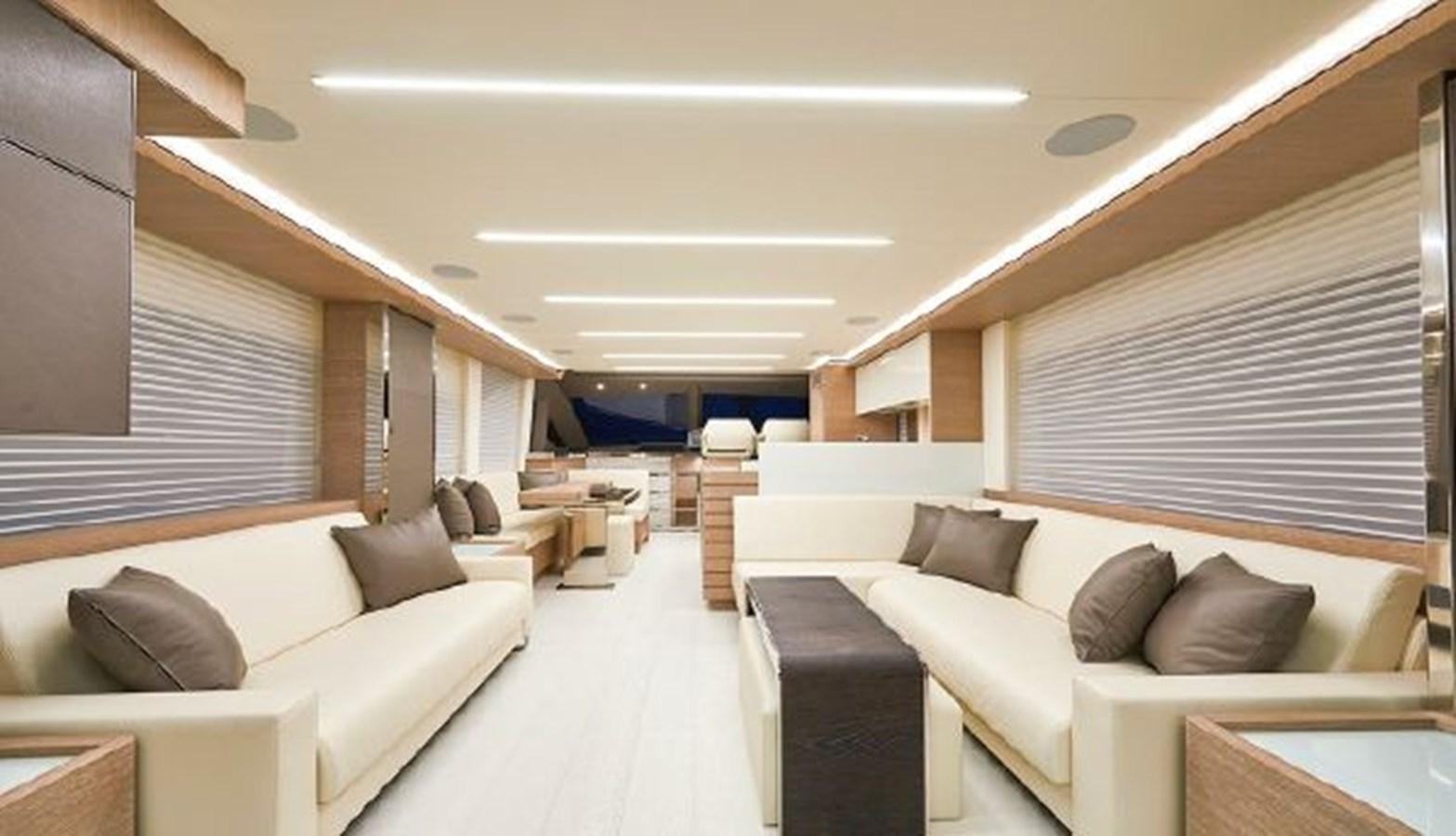 a room with a couch and a bed aboard 2021 ASTONDOA 66 FLYBRIDGE Yacht for Sale