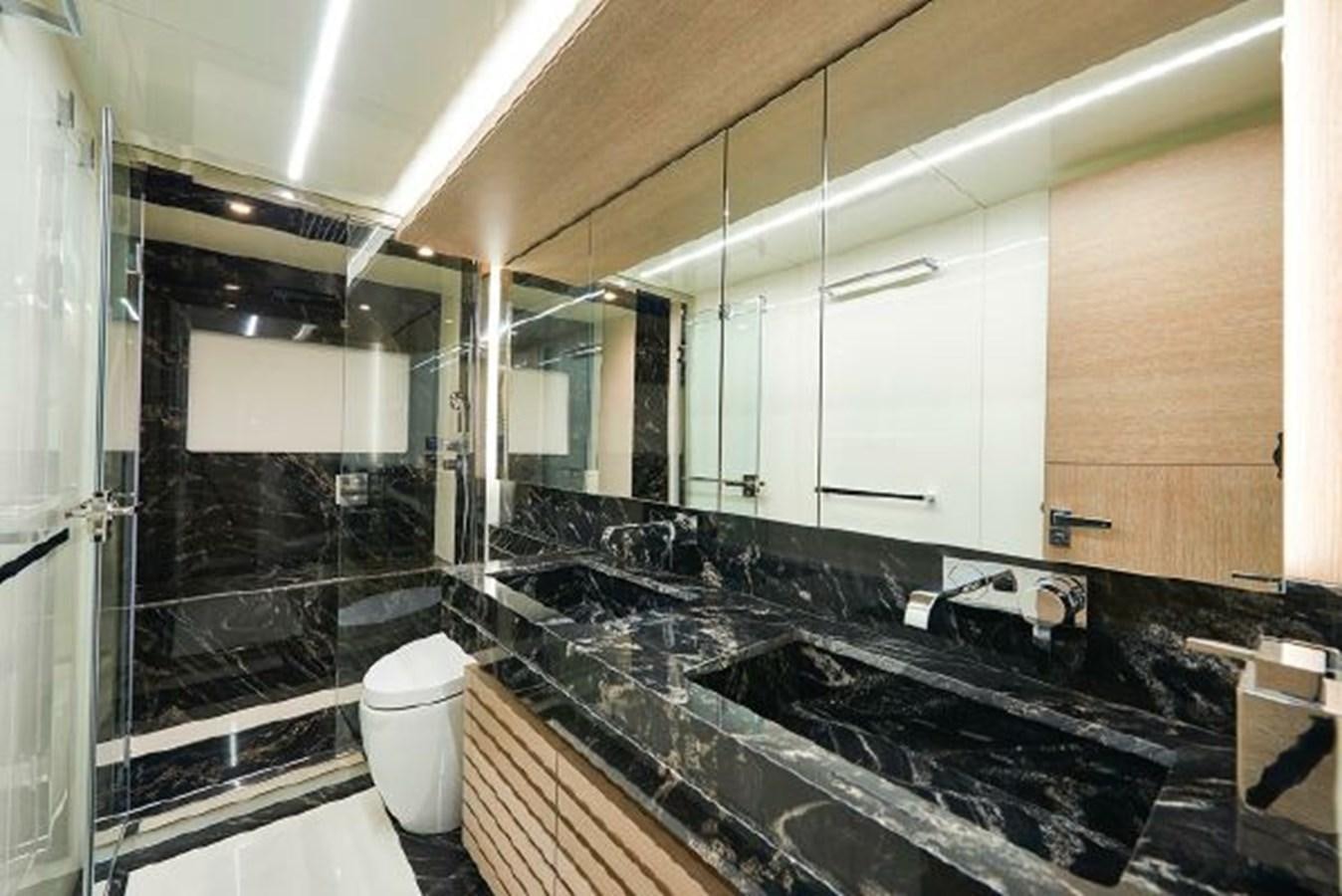 a bathroom with a large countertop aboard 2021 ASTONDOA 66 FLYBRIDGE Yacht for Sale