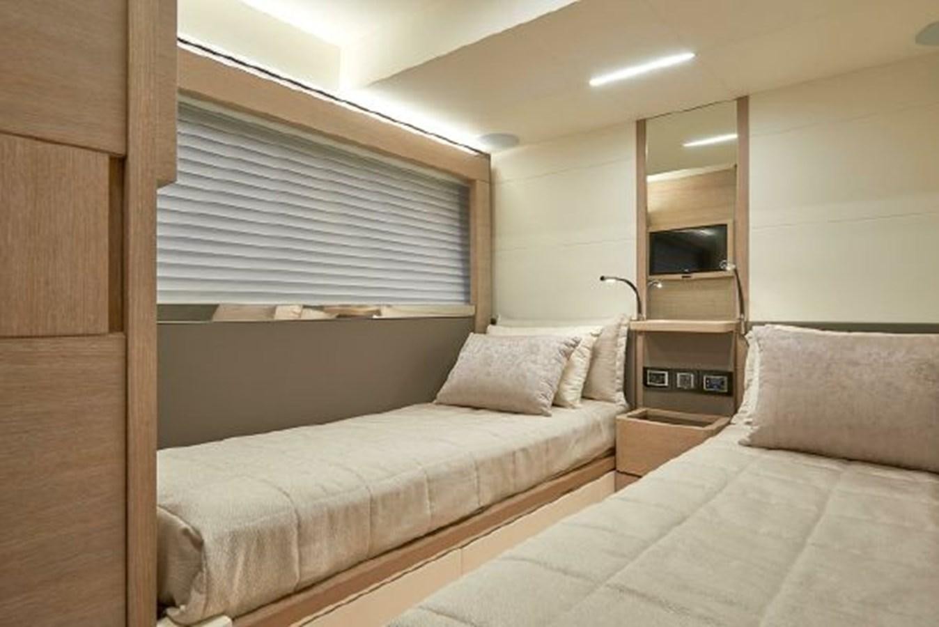 a room with two beds aboard 2021 ASTONDOA 66 FLYBRIDGE Yacht for Sale