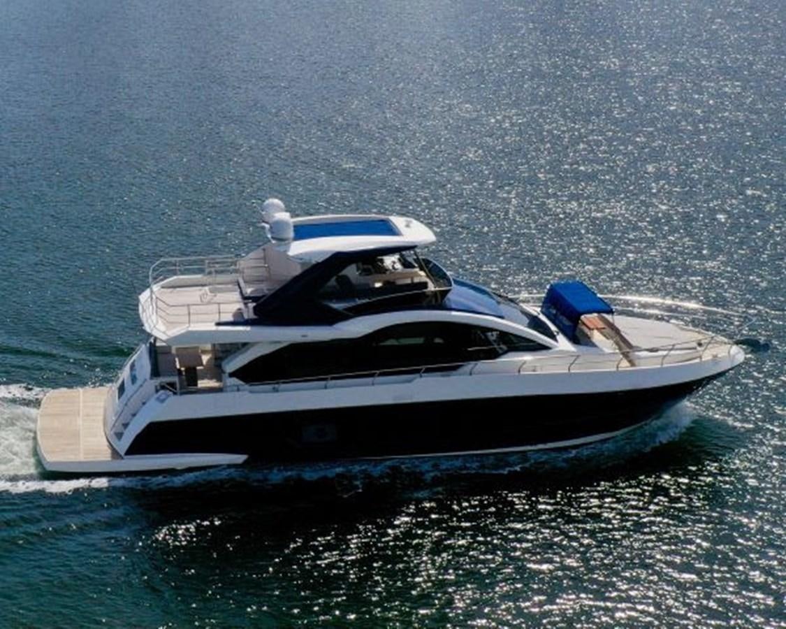 a boat in the water aboard THE ONLY BLUE 66 FLY Yacht for Sale