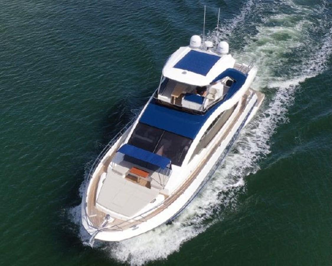 a boat on the water aboard THE ONLY BLUE 66 FLY Yacht for Sale
