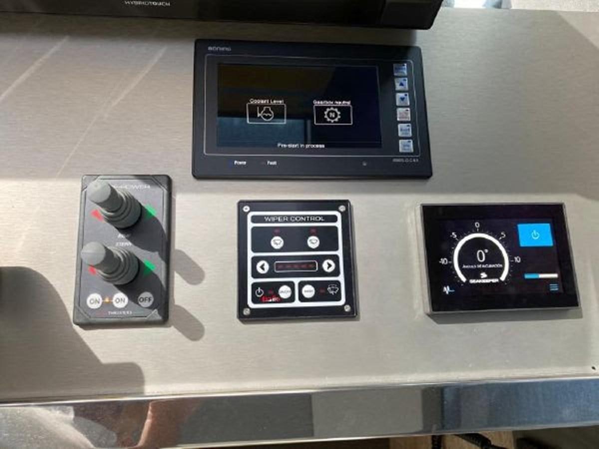 a group of electronic devices aboard THE ONLY BLUE 66 FLY Yacht for Sale
