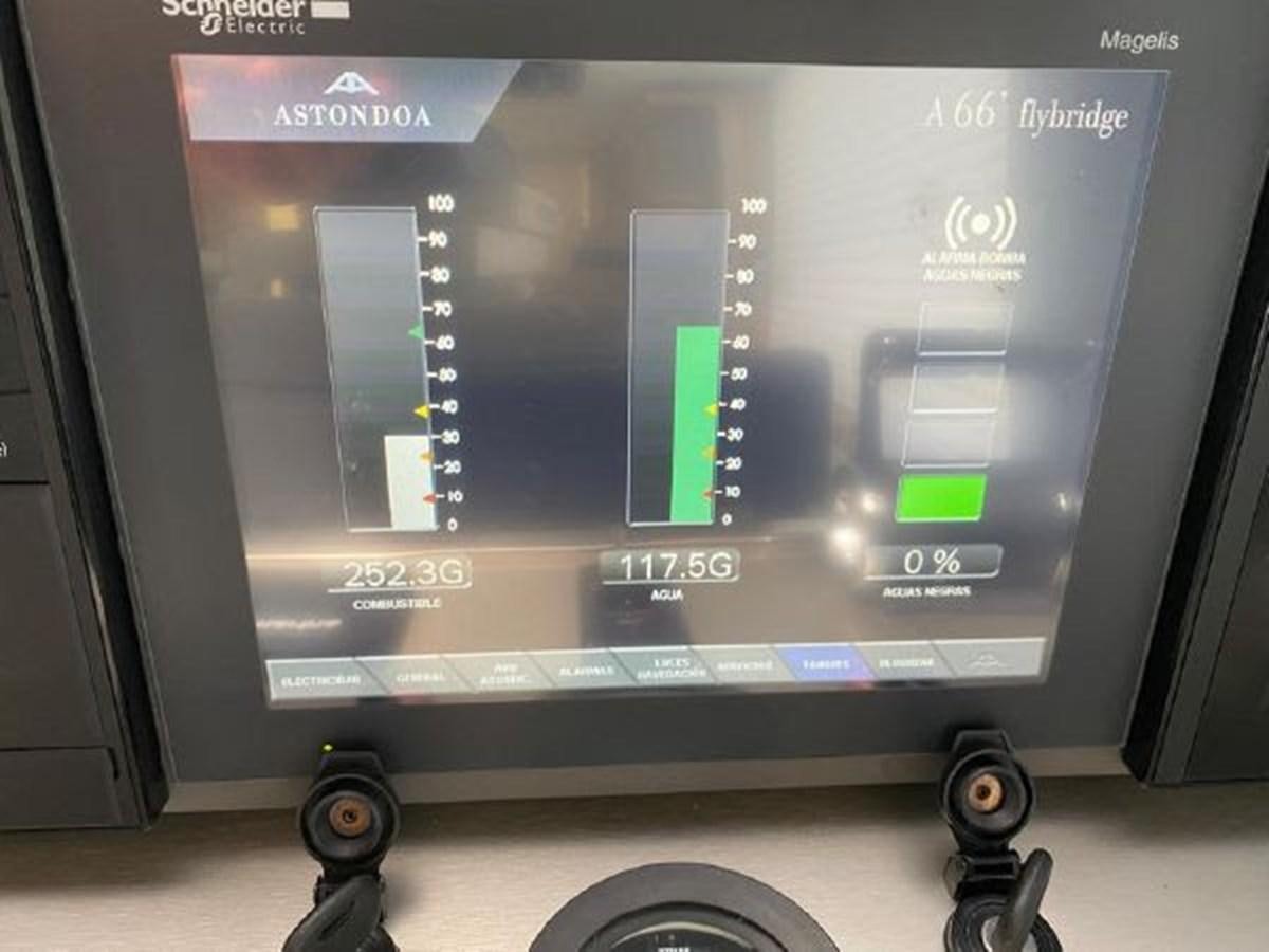 a computer screen with a display aboard THE ONLY BLUE 66 FLY Yacht for Sale