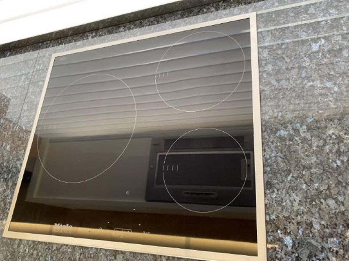 a window with a vent aboard THE ONLY BLUE 66 FLY Yacht for Sale