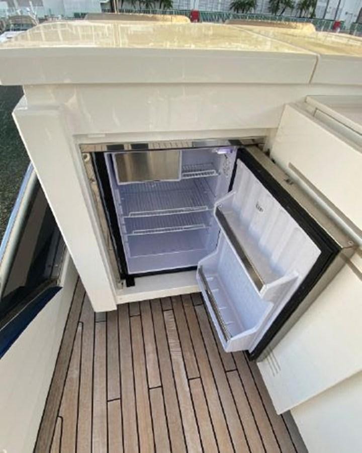 a kitchen with a large oven aboard THE ONLY BLUE 66 FLY Yacht for Sale