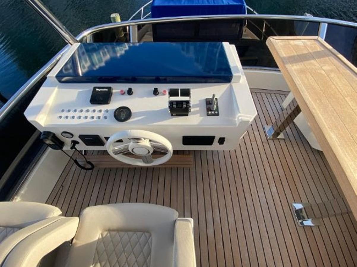 a white rectangular object with a blue object on it aboard THE ONLY BLUE 66 FLY Yacht for Sale