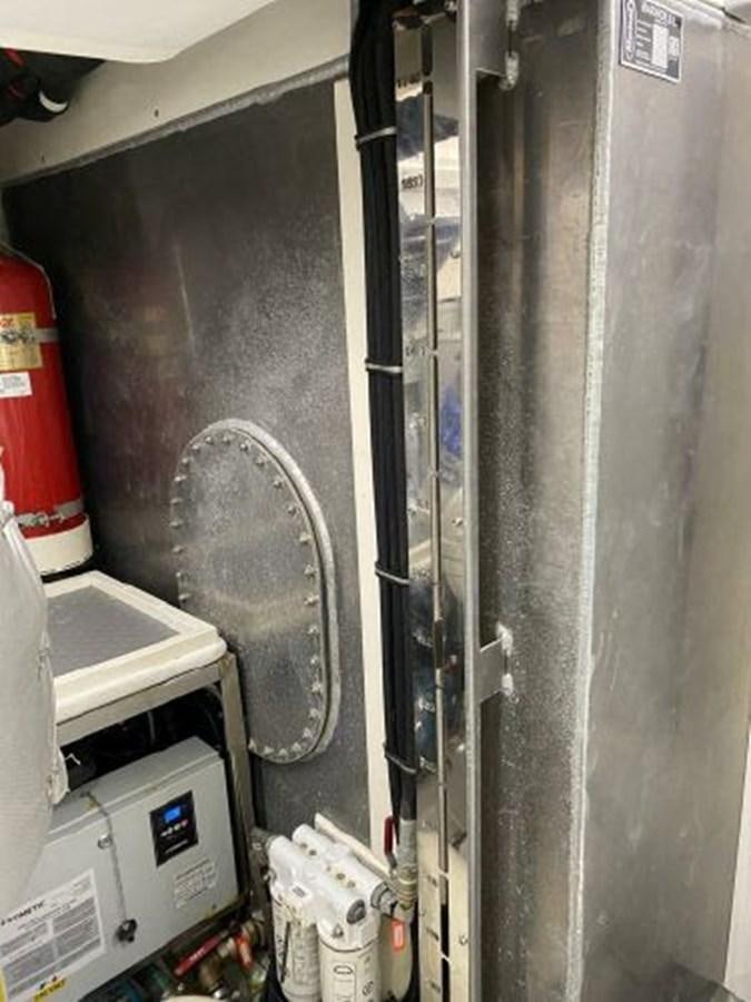 a machine with a large pipe aboard THE ONLY BLUE 66 FLY Yacht for Sale