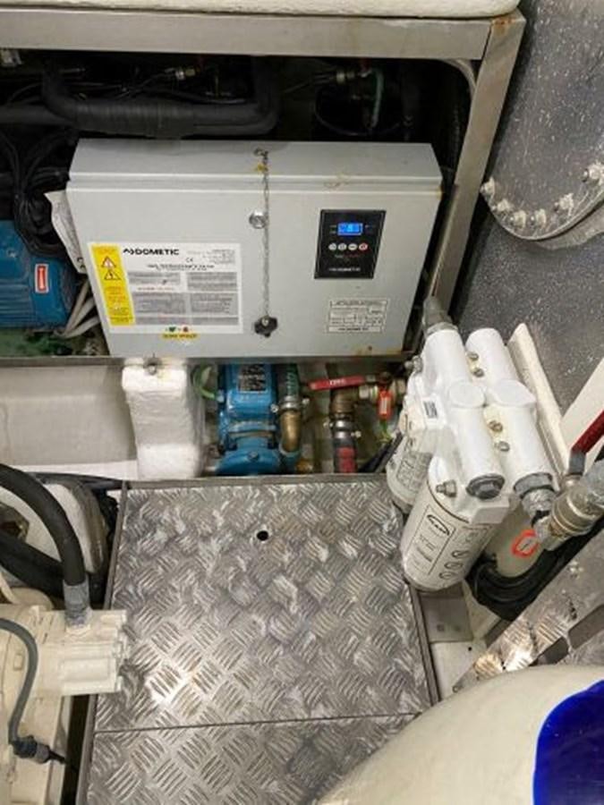 a machine with wires and tubes aboard THE ONLY BLUE 66 FLY Yacht for Sale