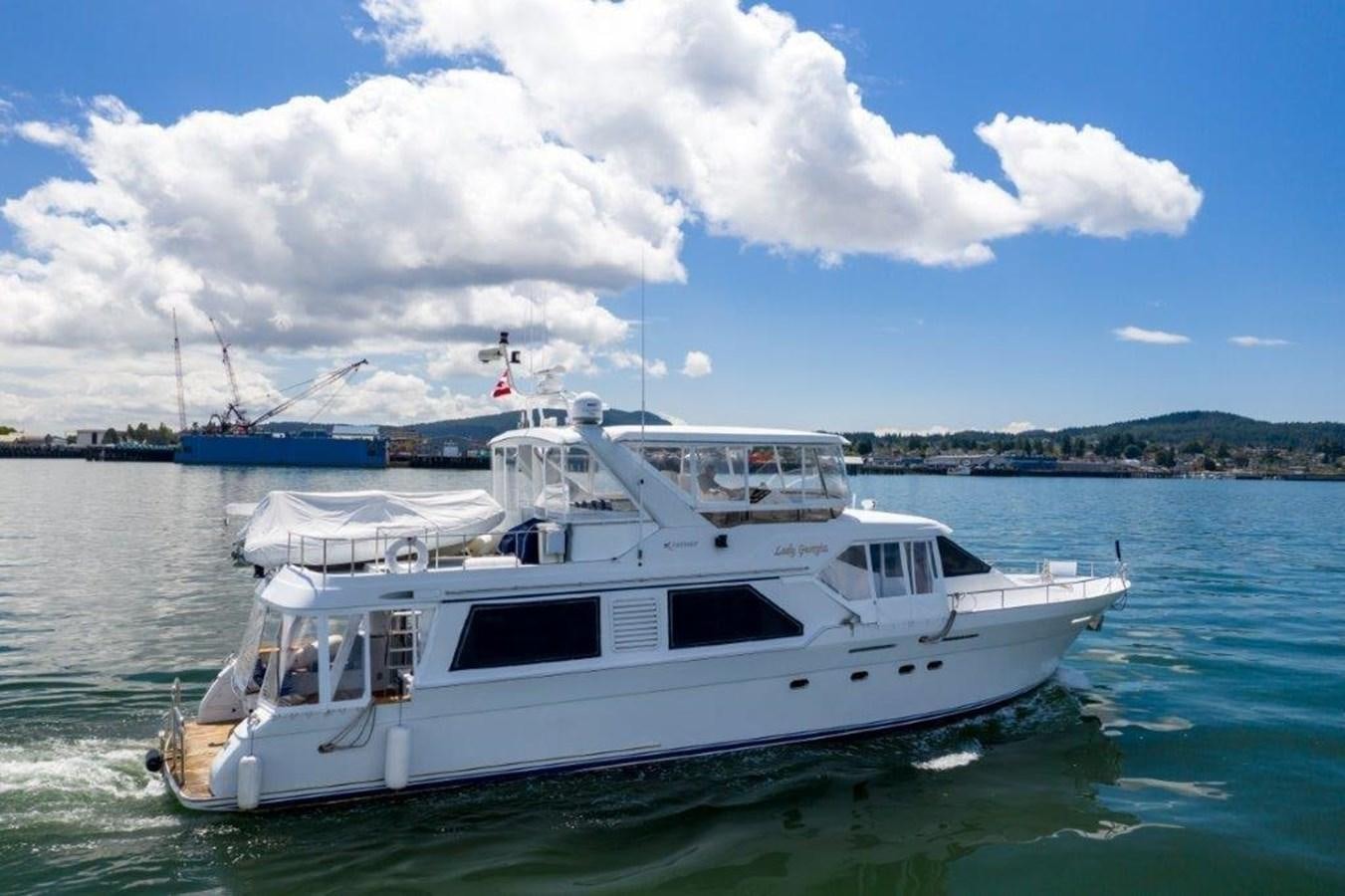 a white boat in the water aboard LADY GEORGIA Yacht for Sale