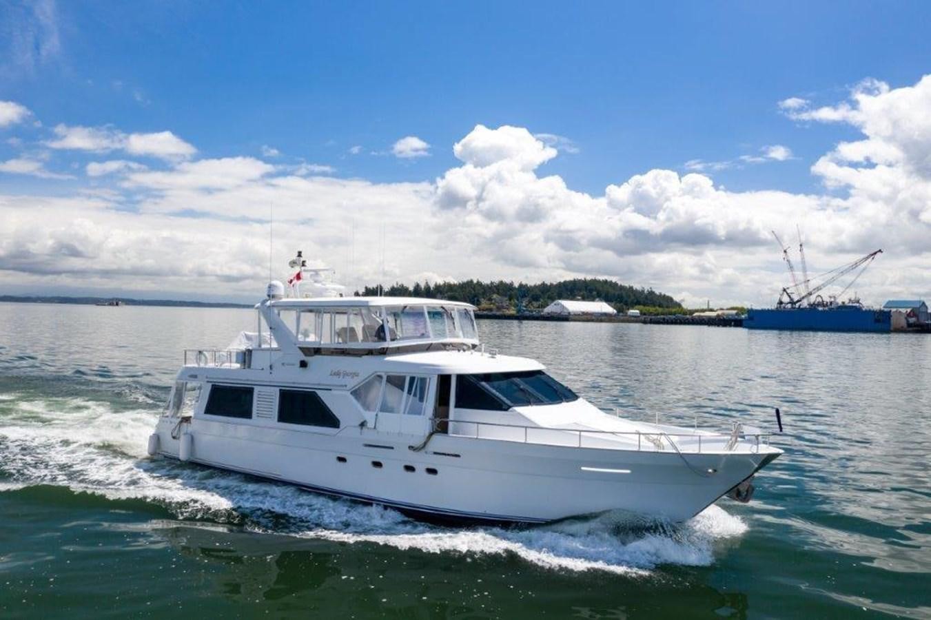 a white yacht in the water aboard LADY GEORGIA Yacht for Sale