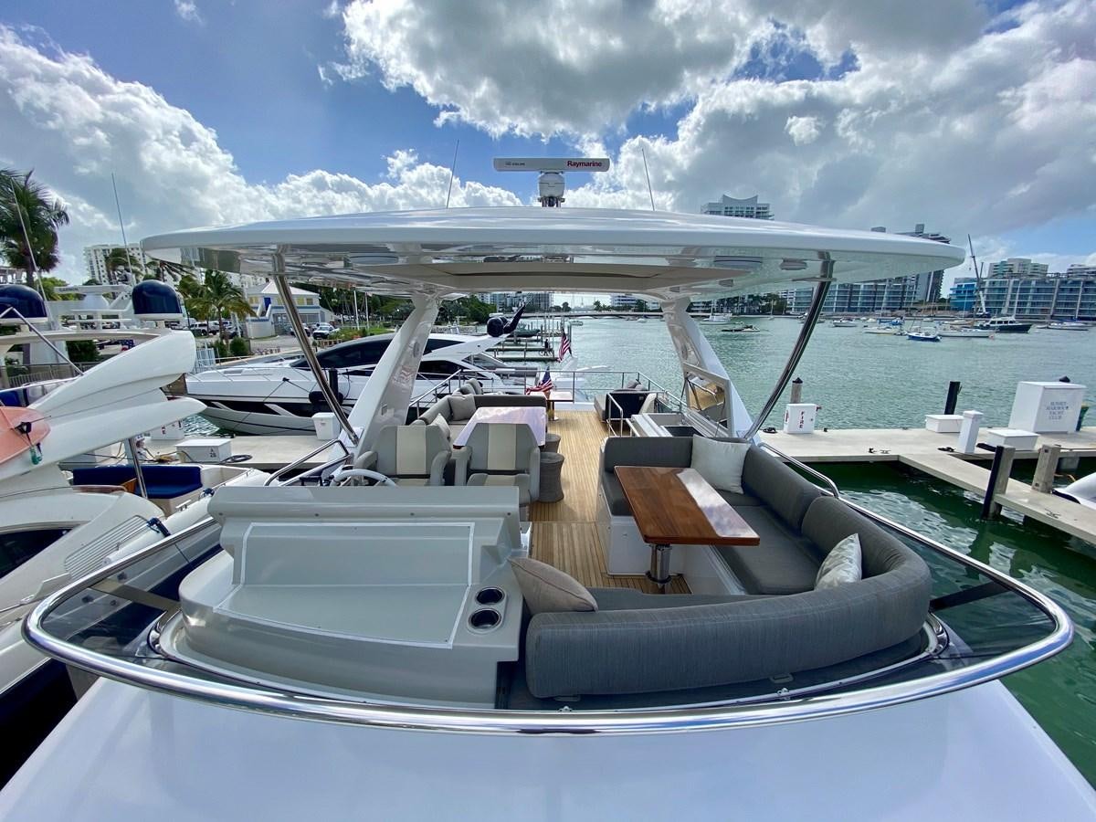 a row of boats on a dock aboard SEARENITY II Yacht for Sale