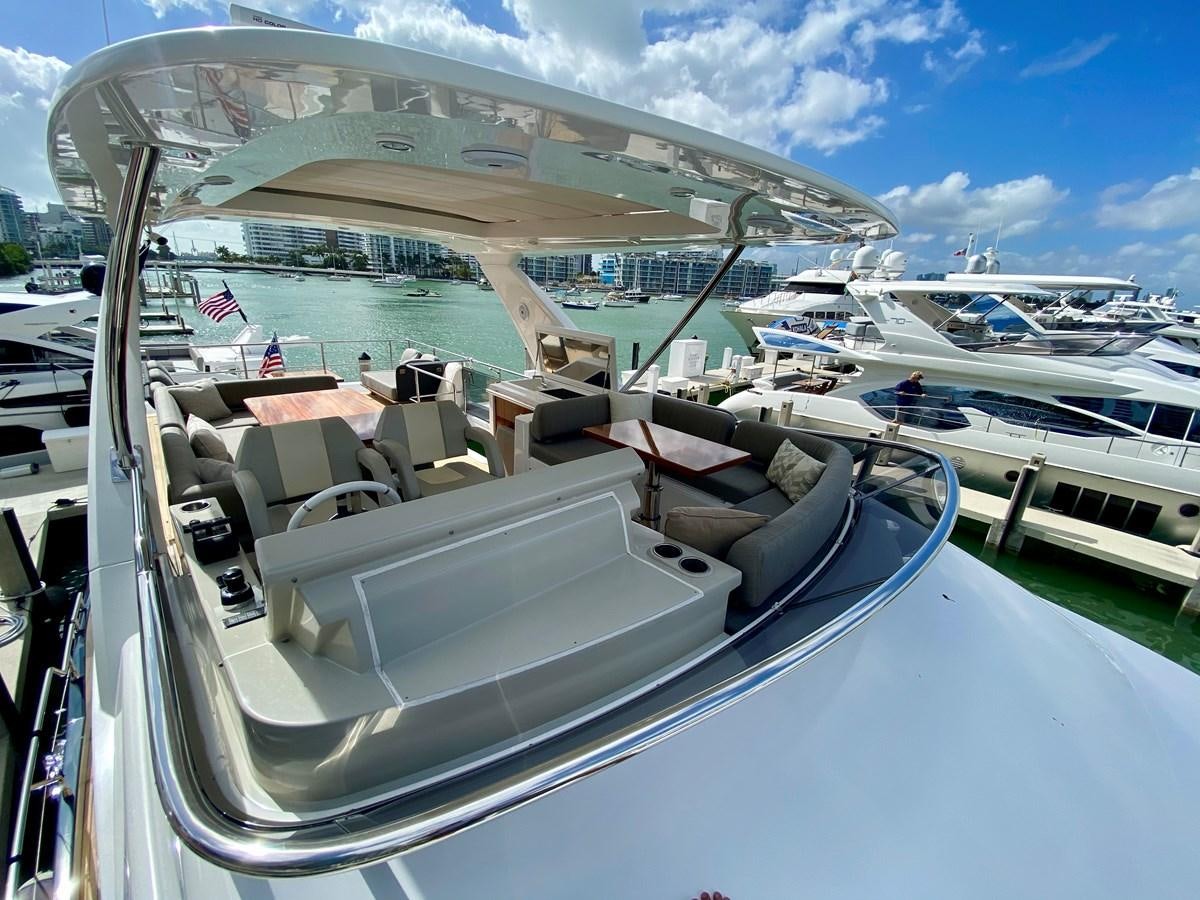 a boat with many seats aboard SEARENITY II Yacht for Sale