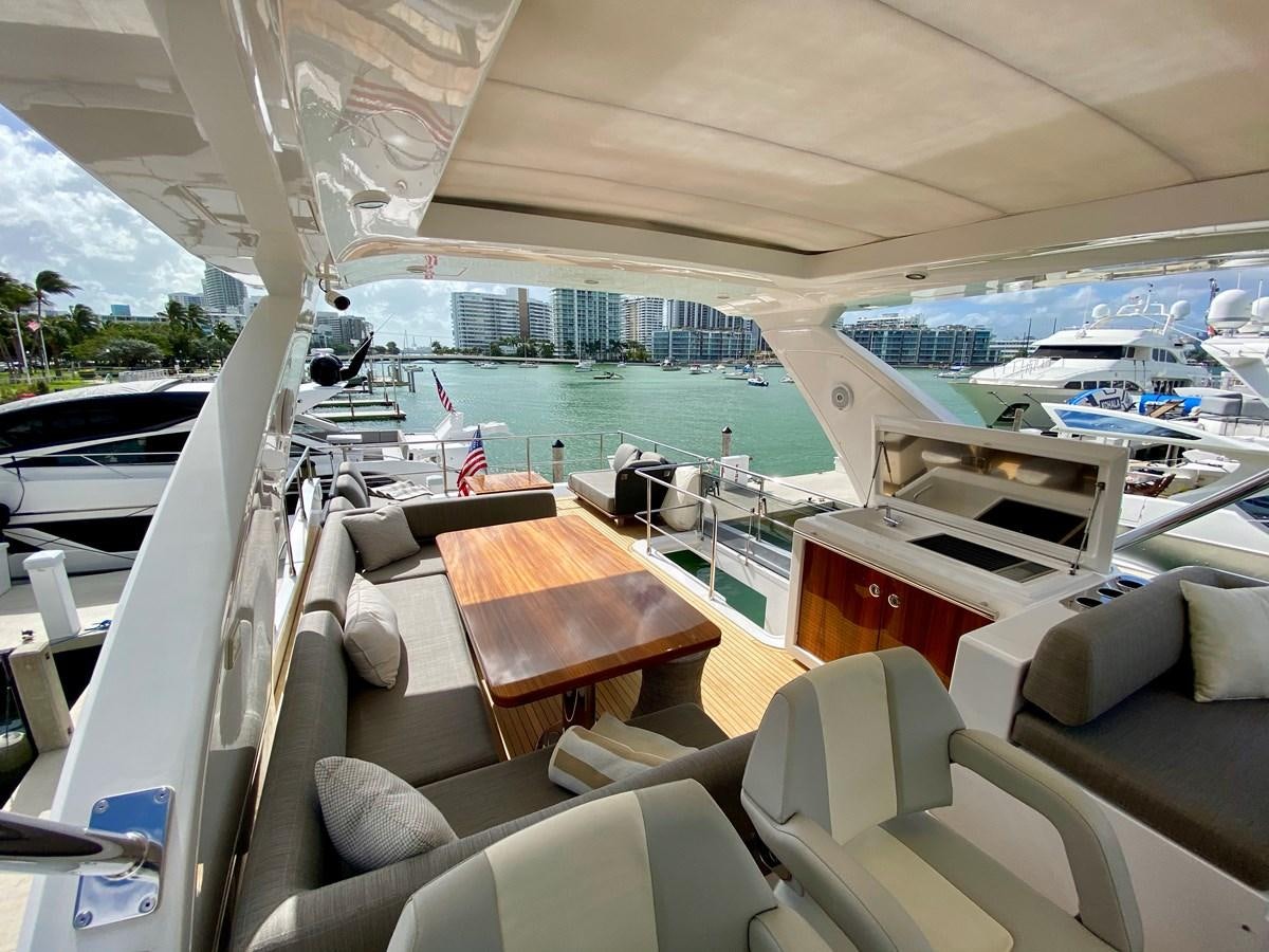 a boat with a view of the water and a city aboard SEARENITY II Yacht for Sale